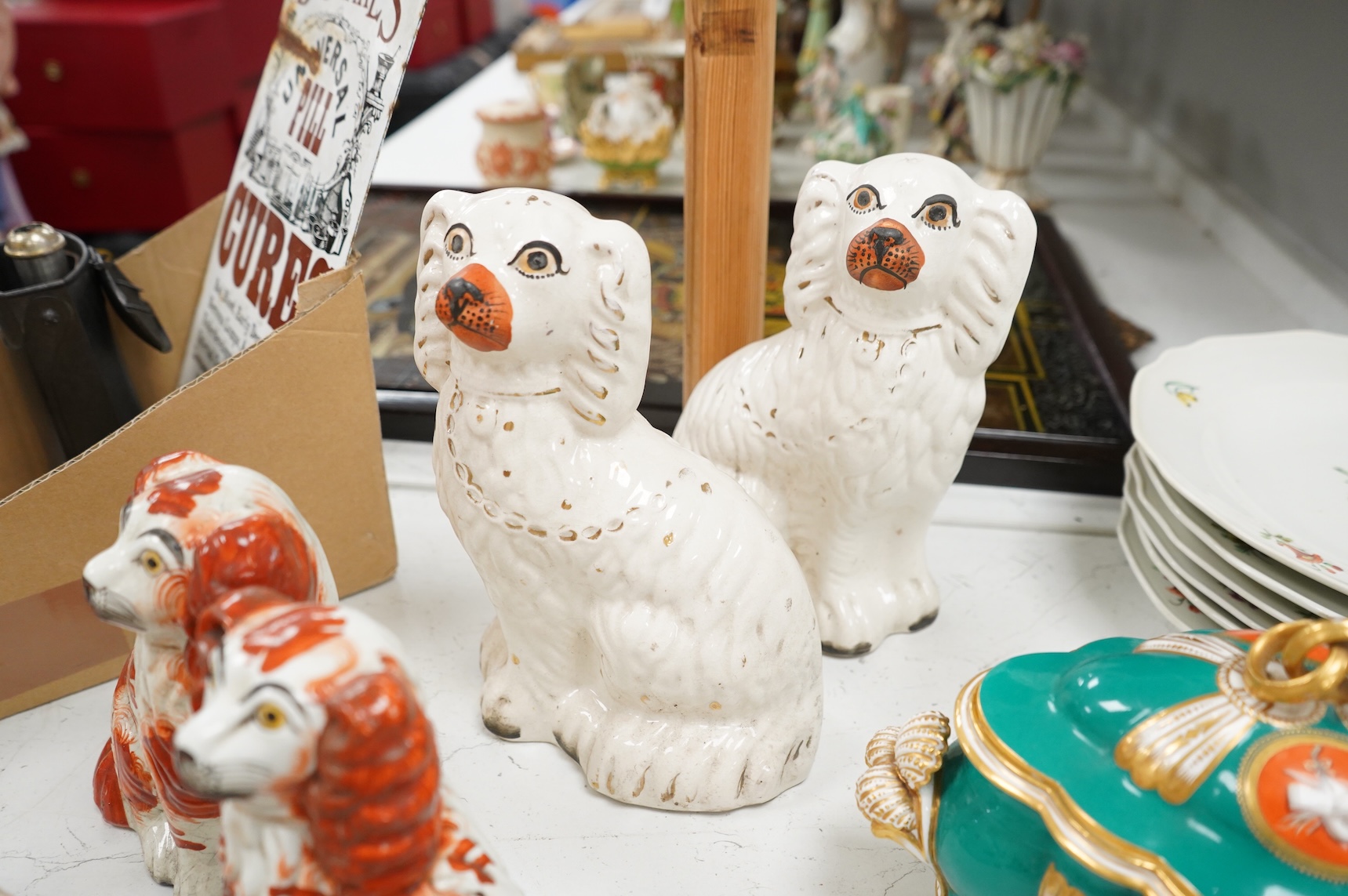 Nine different sized 19th century Staffordshire chimney dogs, tallest 23cm